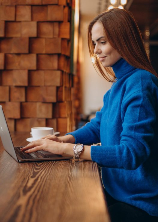 business-woman-working-laptop-cafe